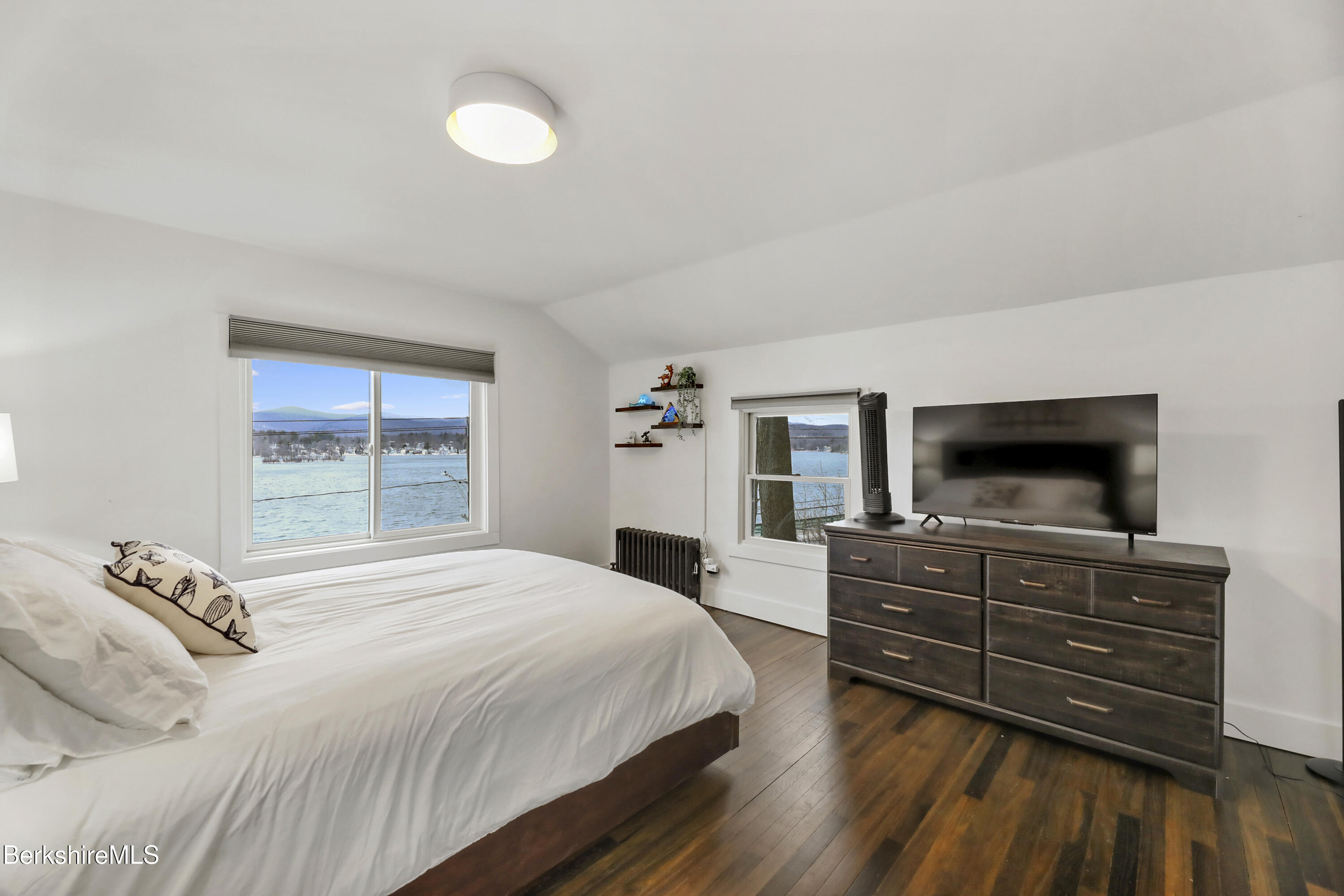 1526 North Street Pittsfield, MA 01201 - Photo 13 of 20 a bedroom with a bed and a television