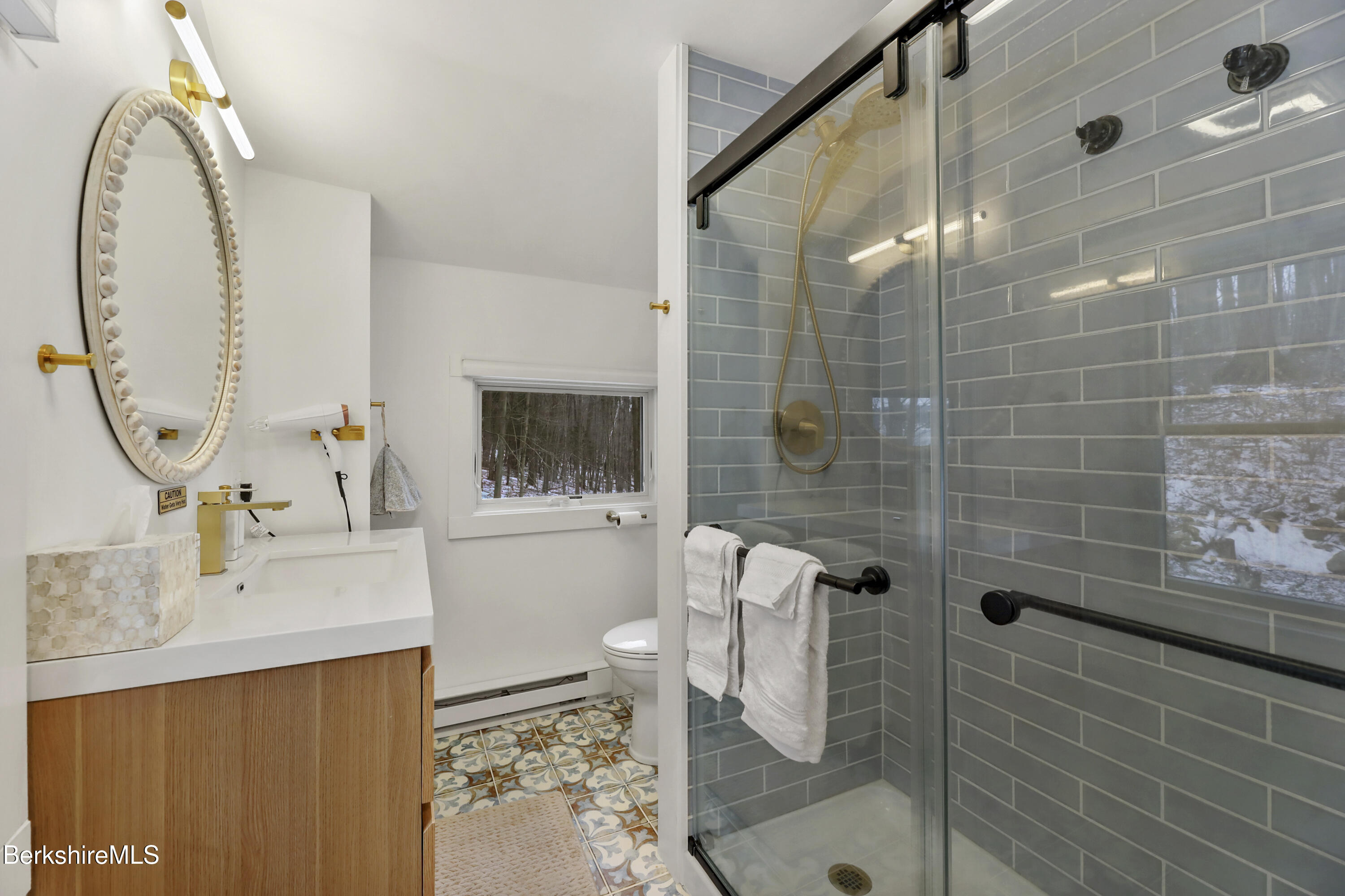 1526 North Street Pittsfield, MA 01201 - Photo 17 of 20 a bathroom with a sink a toilet and shower