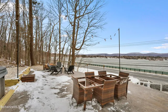 a view of a terrace with furniture and sitting area