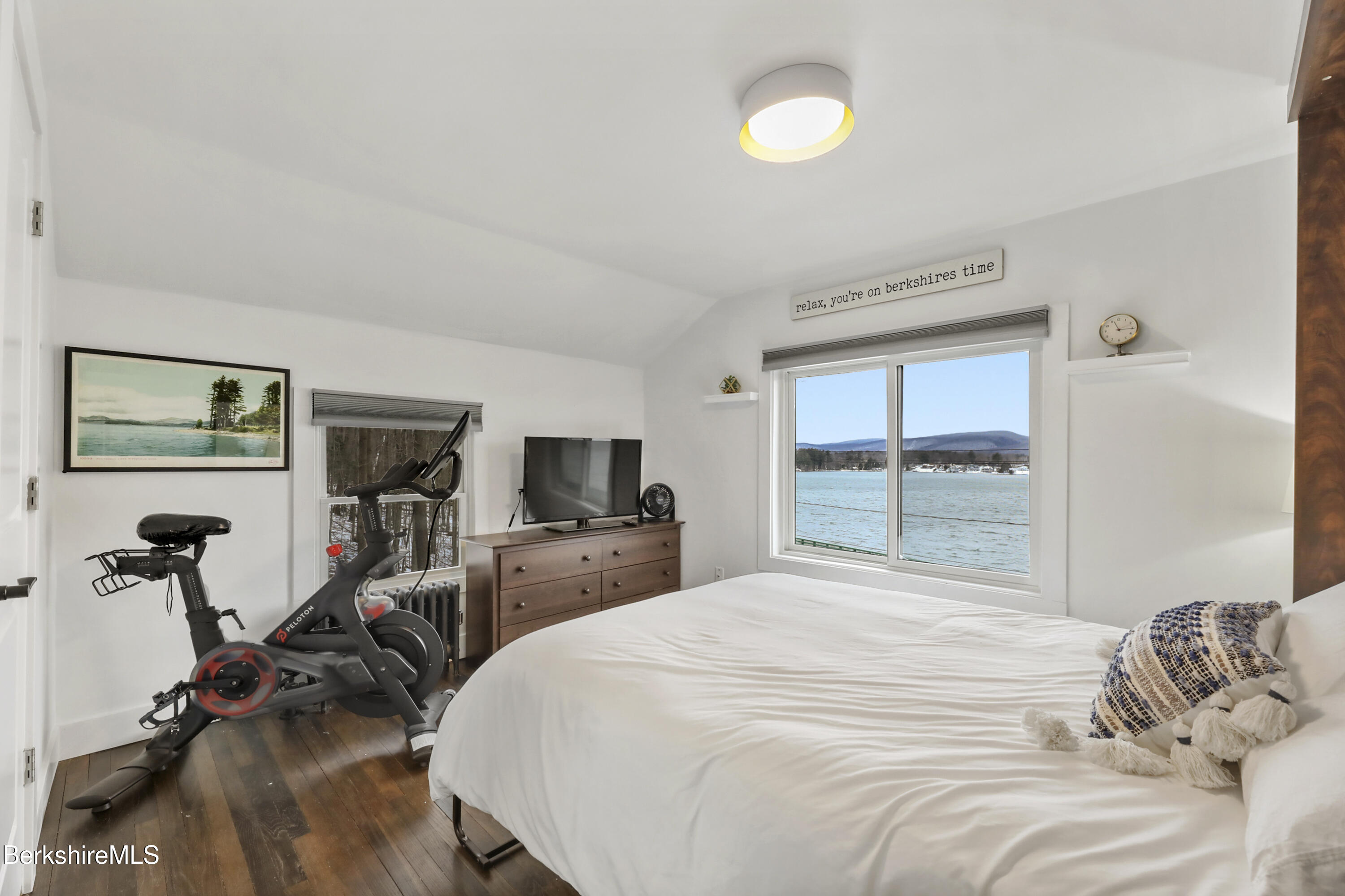 1526 North Street Pittsfield, MA 01201 - Photo 4 of 20 a bedroom with a bed and a flat tv screen on the dresser