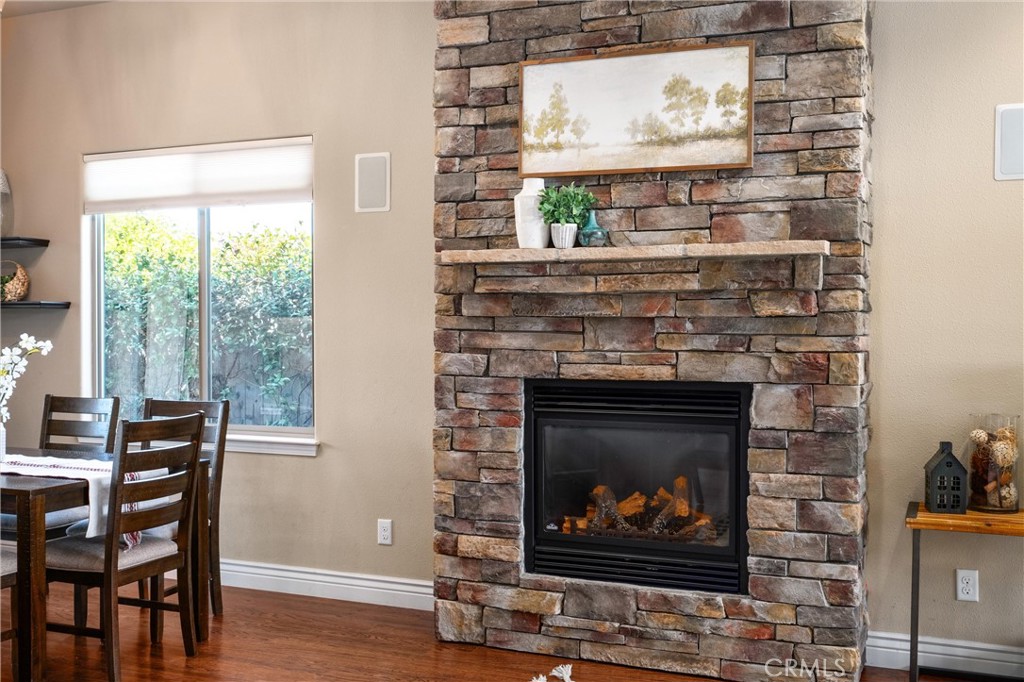 2775 Levi Lane Chico, CA 95973 - Photo 12 of 34 a living room with a fireplace and a table