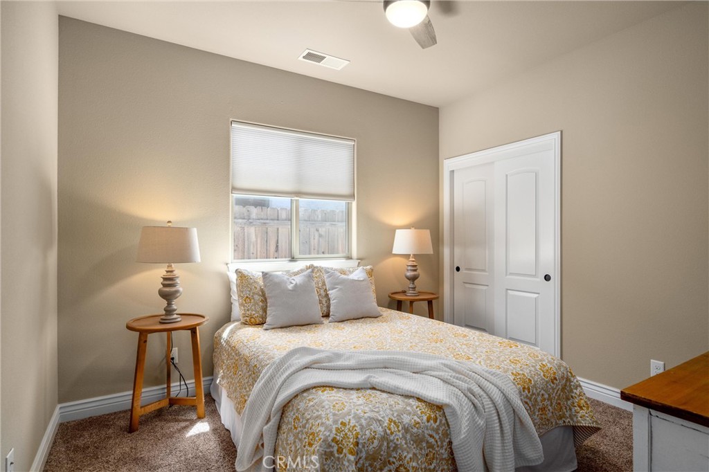 2775 Levi Lane Chico, CA 95973 - Photo 21 of 34 a bedroom with a bed and a window