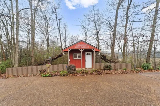 a kitchen with granite countertop a refrigerator stove and microwave