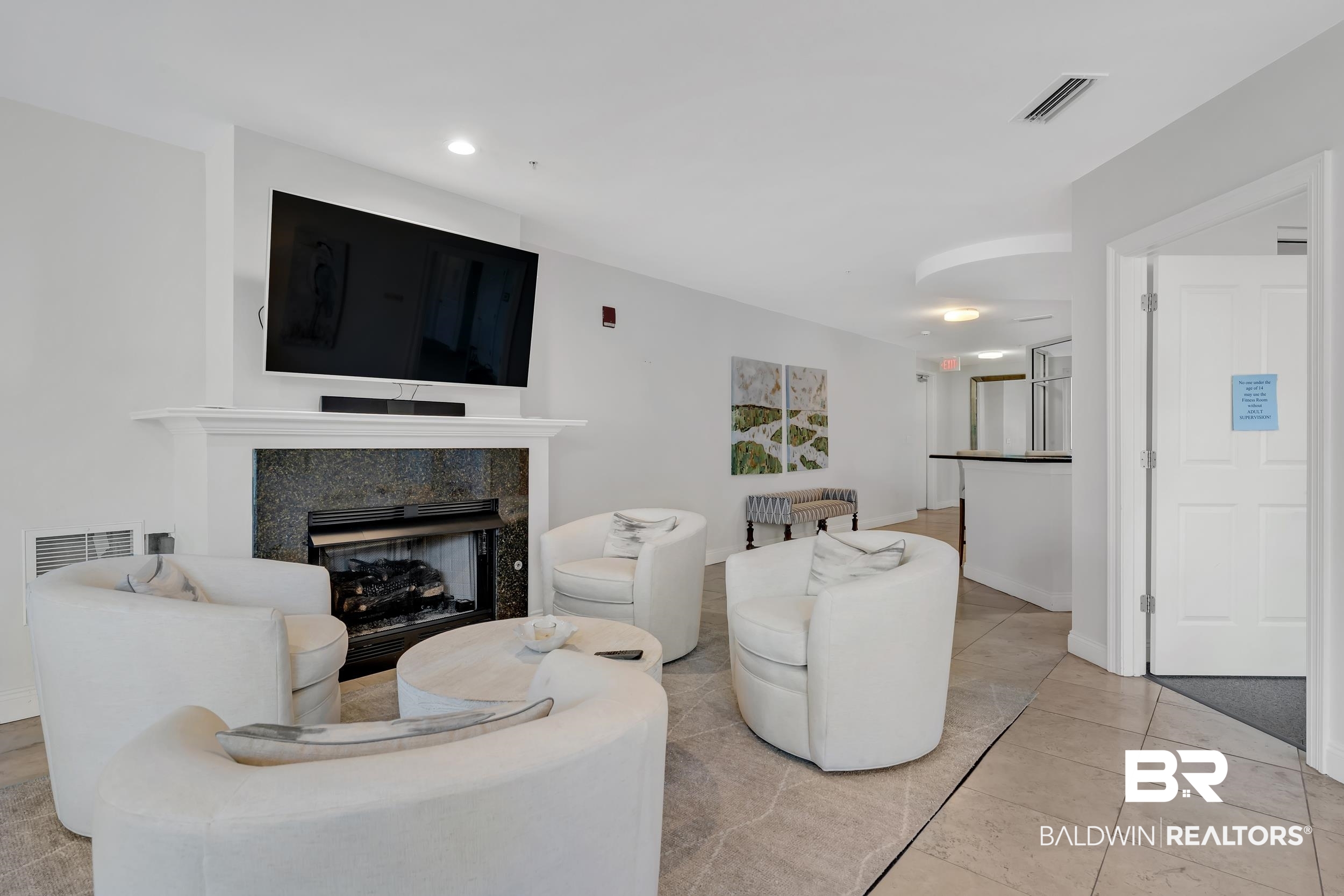 28250 Canal Road, Unit 307 Orange Beach, AL 36561 - Photo 51 of 56 Living room featuring a premium fireplace, light tile patterned floors, and recessed lighting