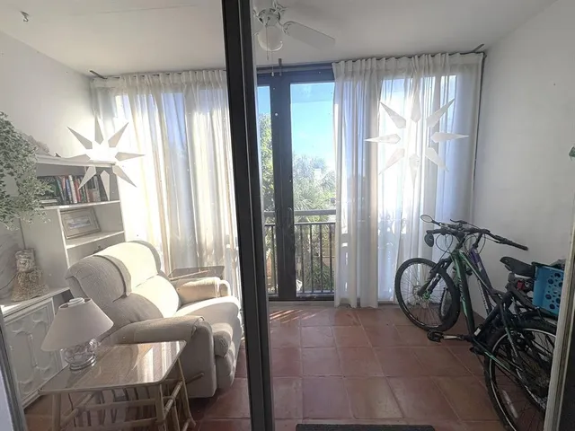 a view of a livingroom with furniture