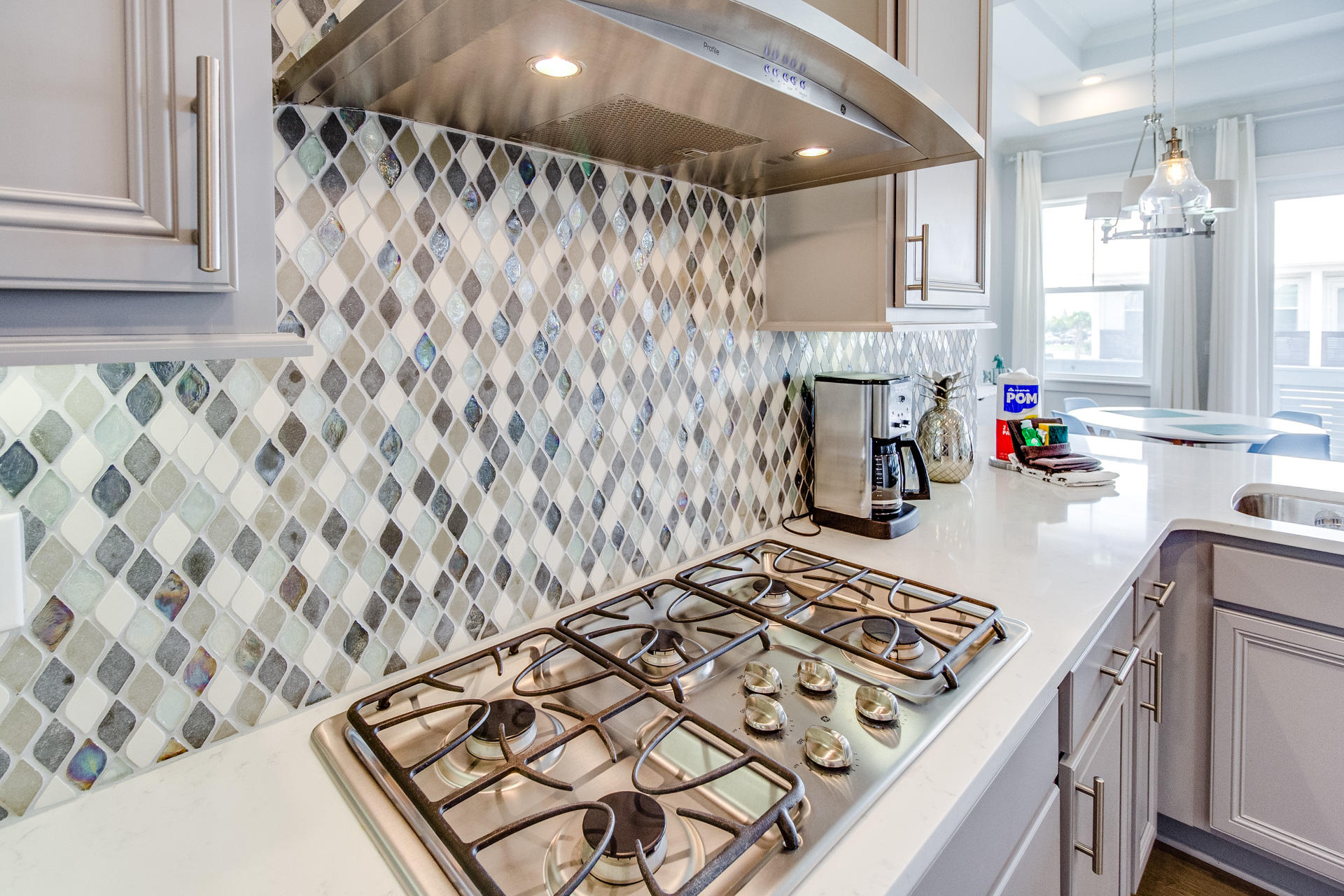 10 York Ln Inlet Beach, Unit C289 Inlet Beach, FL 32461 - Photo 11 of 32 a kitchen with a stove and cabinets