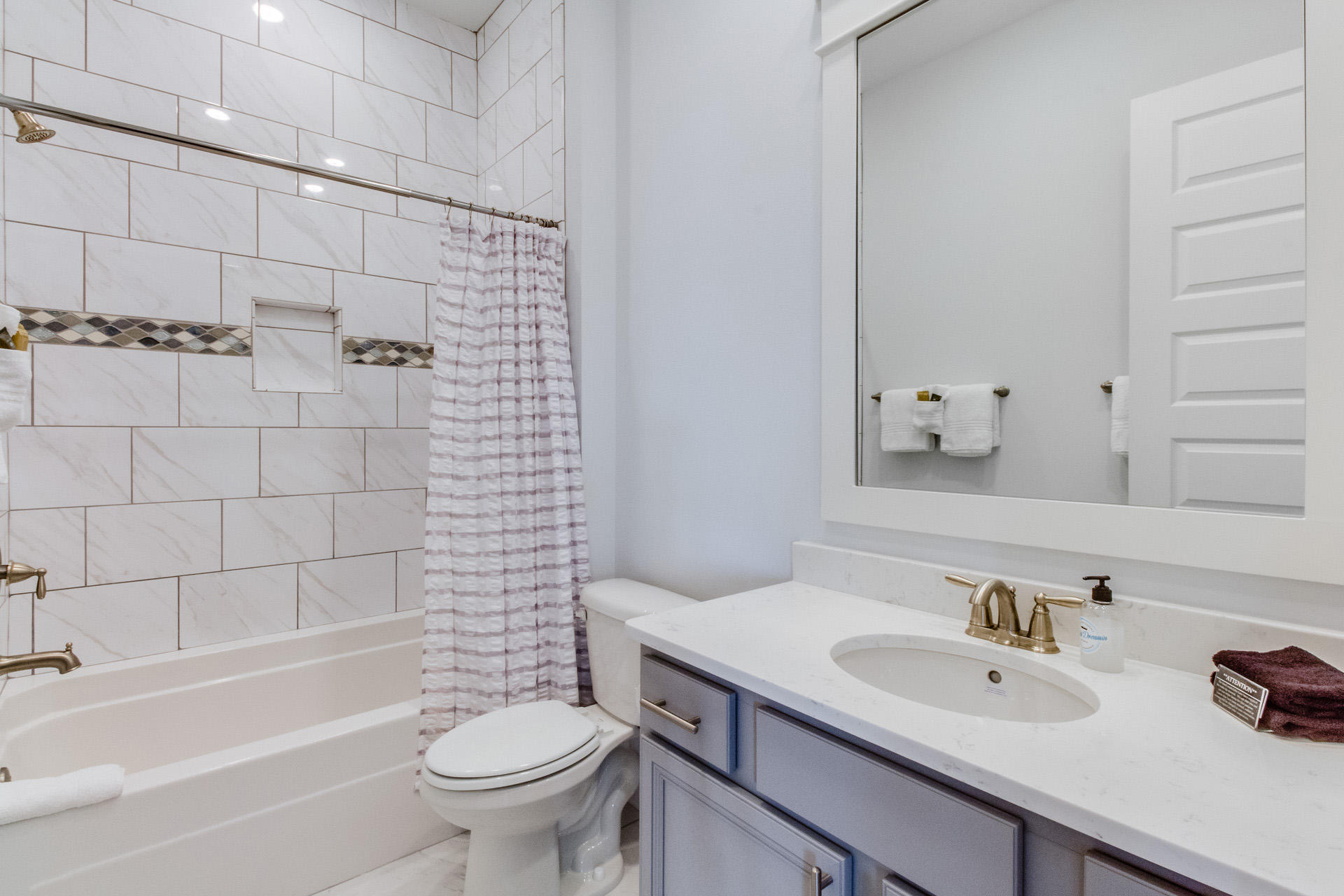 10 York Ln Inlet Beach, Unit C289 Inlet Beach, FL 32461 - Photo 19 of 32 a bathroom with a sink a toilet and shower