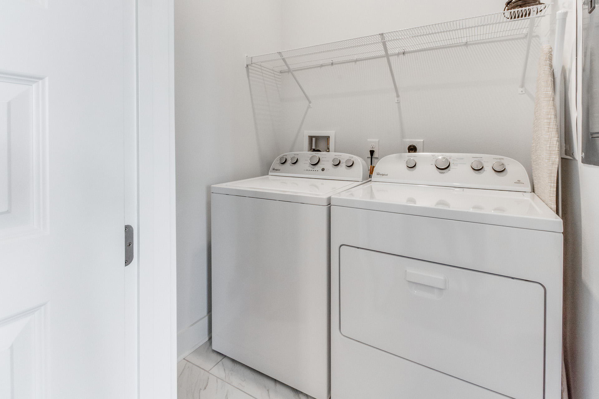 10 York Ln Inlet Beach, Unit C289 Inlet Beach, FL 32461 - Photo 21 of 32 a utility room with dryer and washer