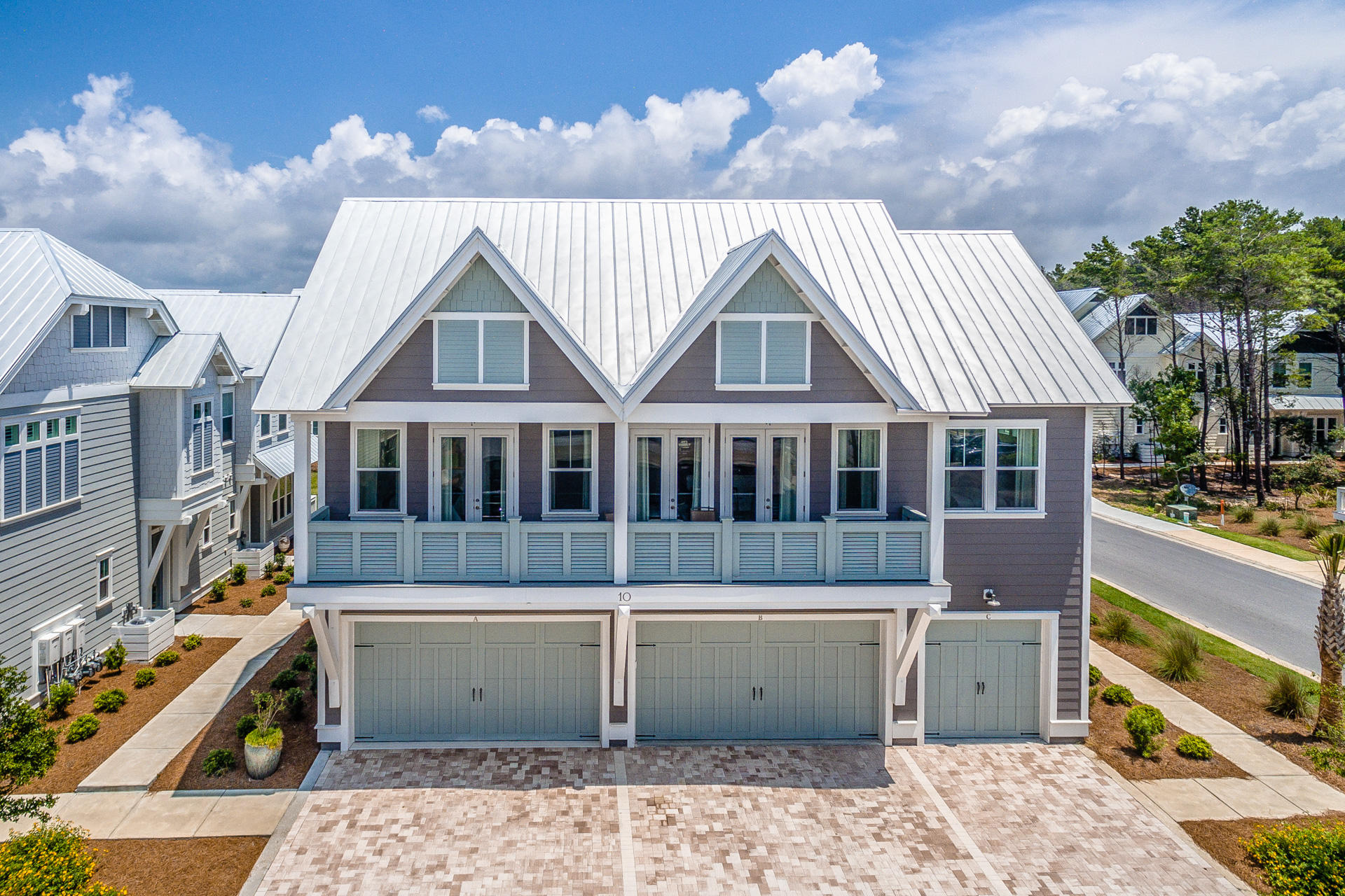 10 York Ln Inlet Beach, Unit C289 Inlet Beach, FL 32461 - Photo 26 of 32 a view of a house with a yard