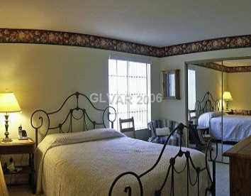 9325 West Desert Inn Road, Unit 163 Las Vegas, NV 89117 - Photo 5 of 7 Master Bedroom.