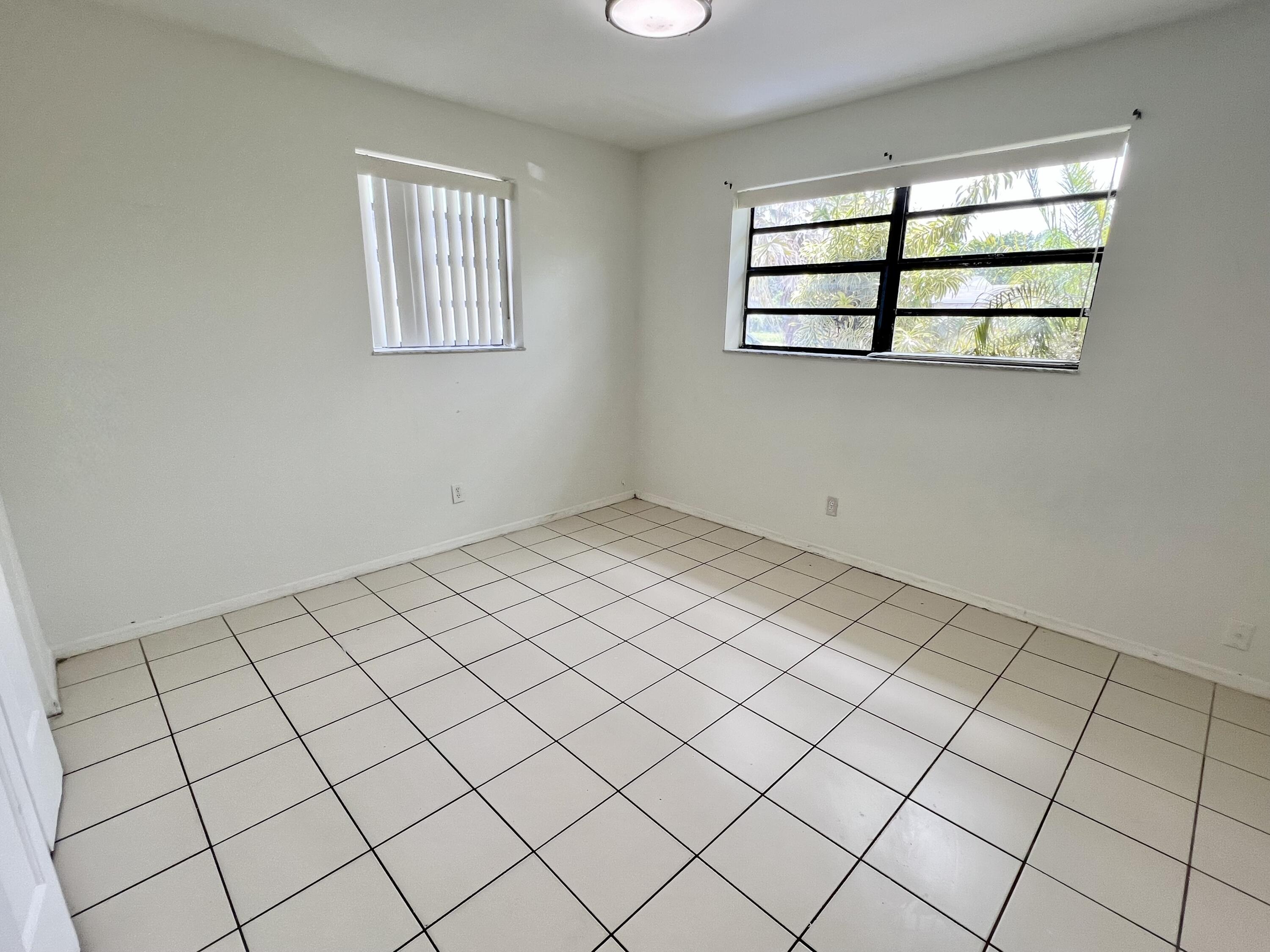 6129 Funston Street Hollywood, FL 33023 - Photo 13 of 18 an empty room with windows