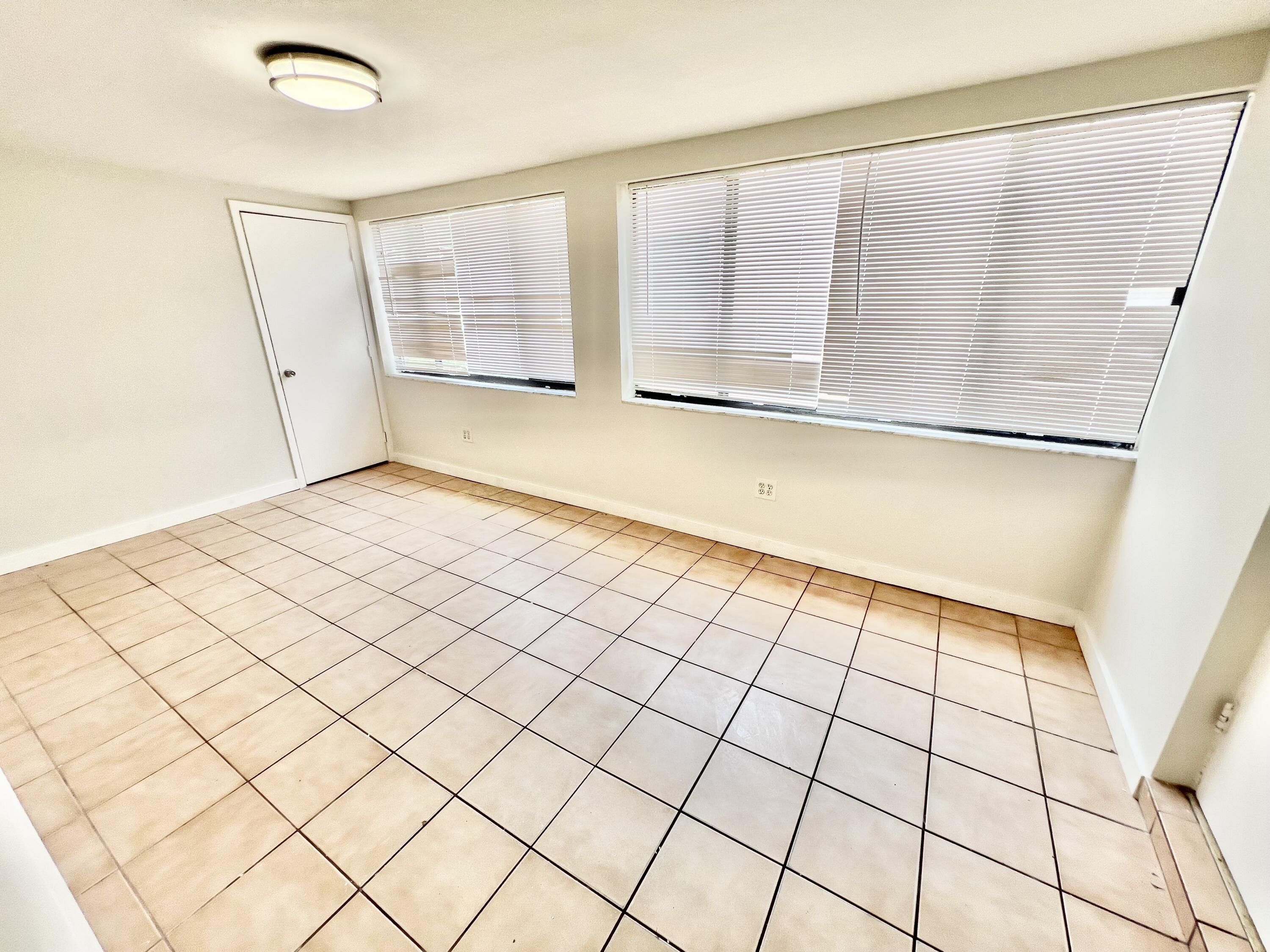 6129 Funston Street Hollywood, FL 33023 - Photo 8 of 18 a view of an empty room and window