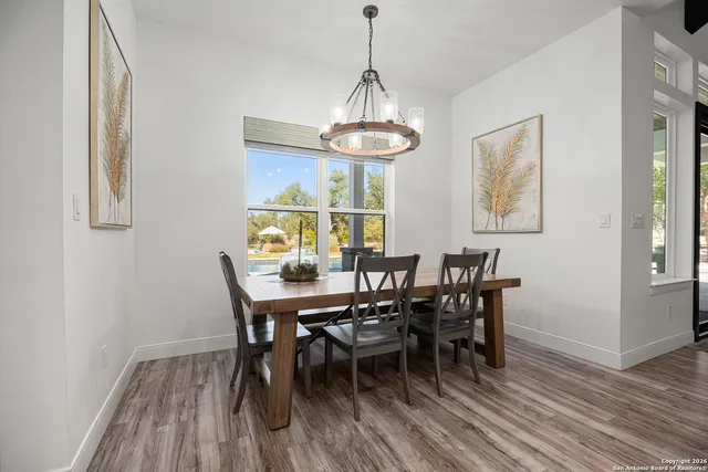 a kitchen with stainless steel appliances granite countertop a stove a sink and a cabinets