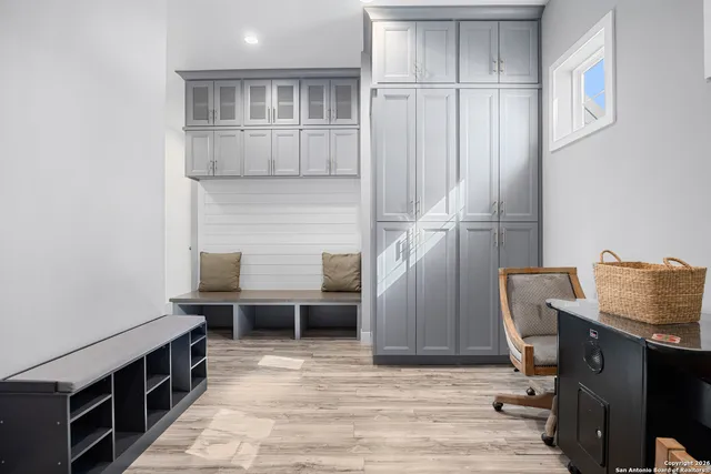 a room with closet and wooden floor