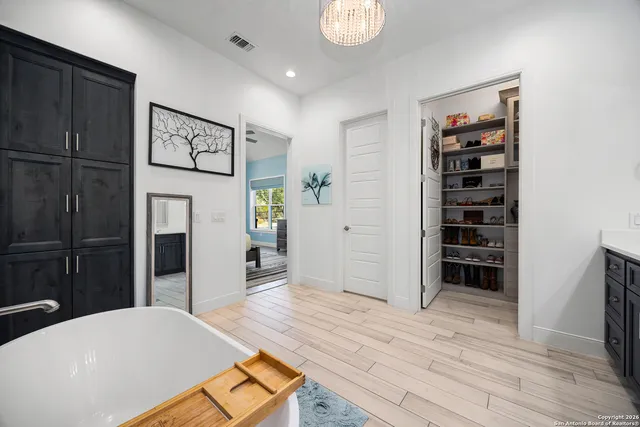 a kitchen with a stove and cabinets
