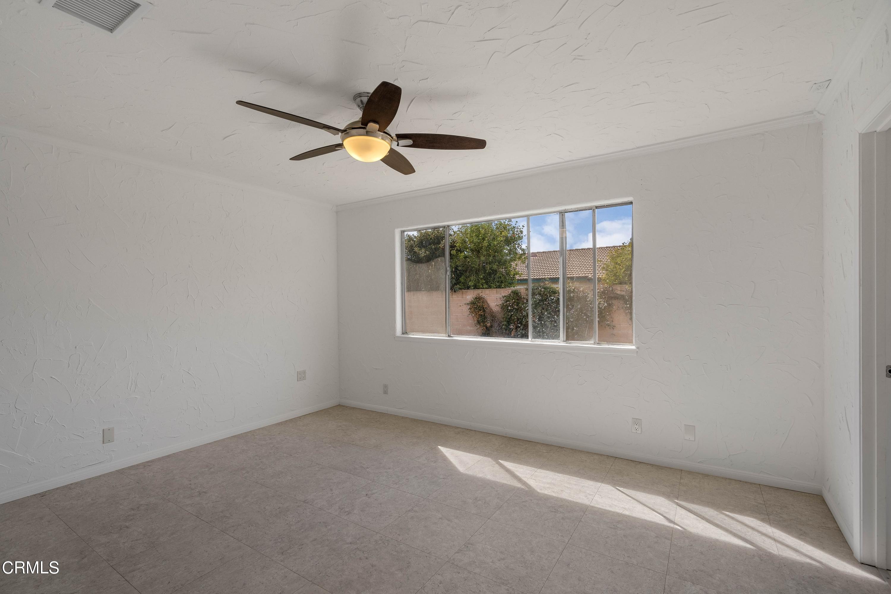 1121 Rachel Drive Oxnard, CA 93030 - Photo 16 of 21 a view of an empty room with a window