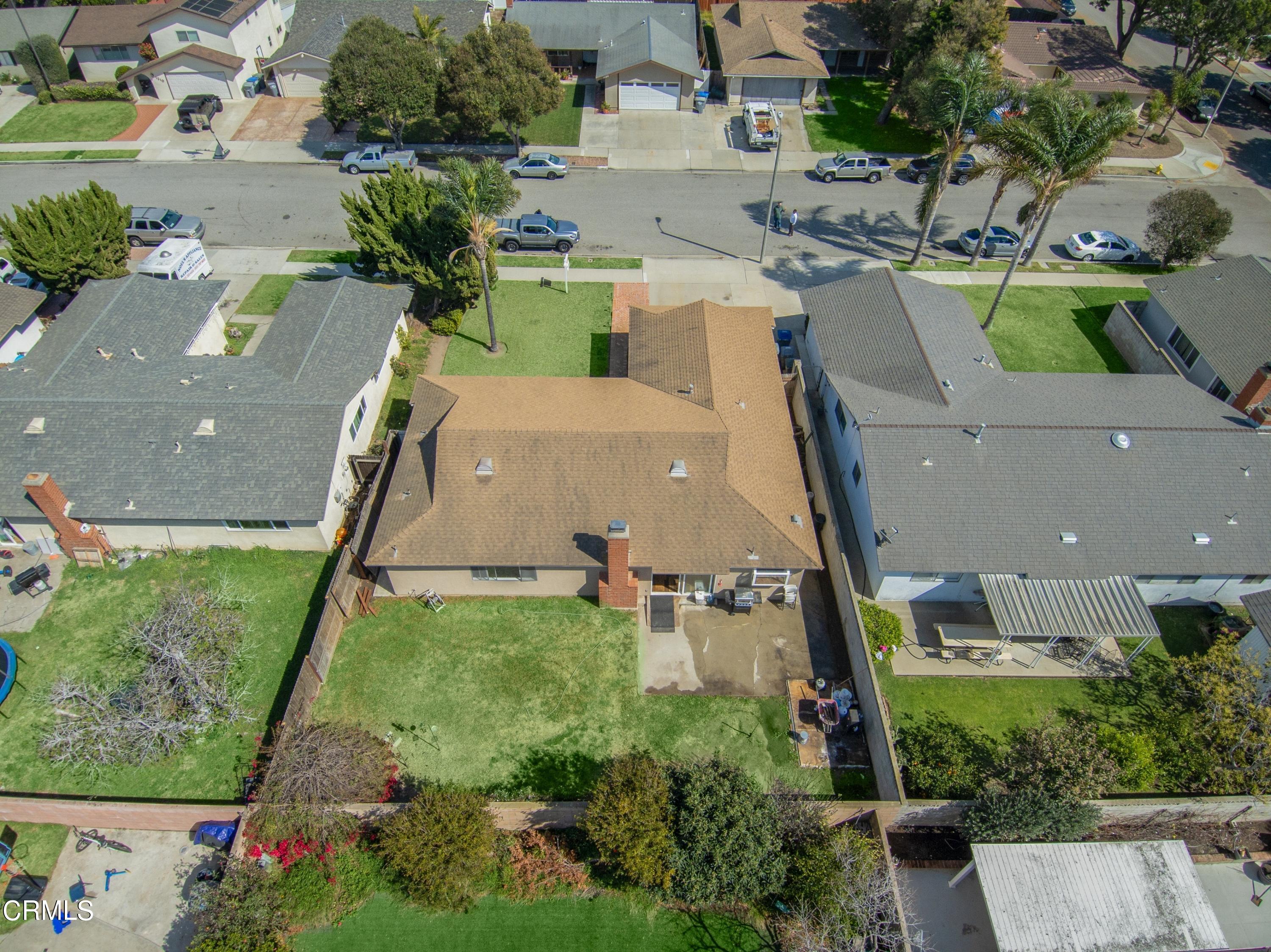 1121 Rachel Drive Oxnard, CA 93030 - Photo 19 of 21 an aerial view of a house with a yard and lake