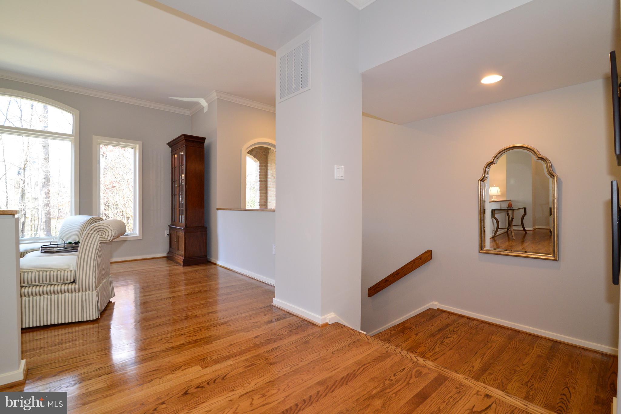 11520 Hemingway Drive Reston, VA 20194 - Photo 2 of 69 Refinished hardwoods catch the afternoon light