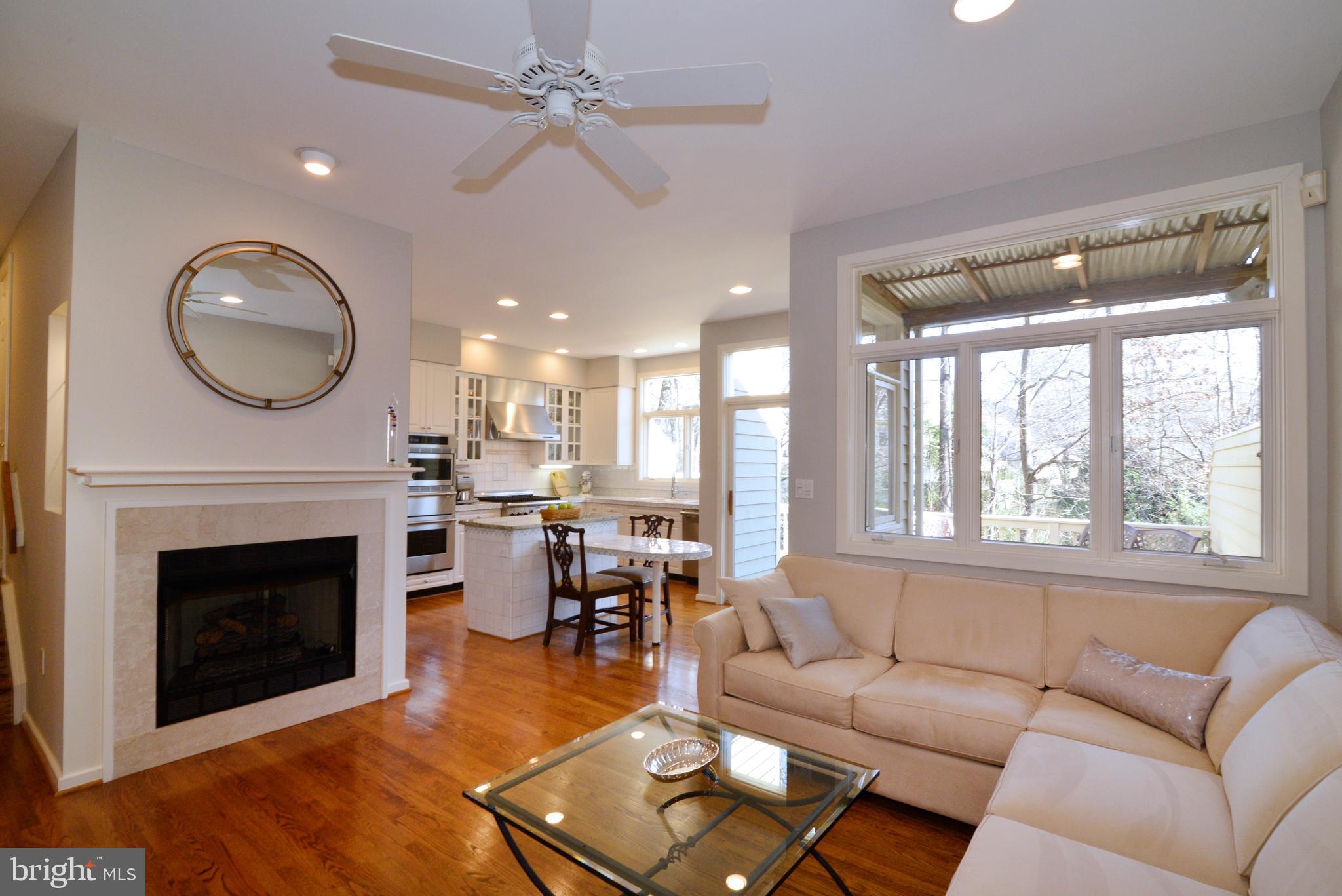 11520 Hemingway Drive Reston, VA 20194 - Photo 11 of 69 Warm & cozy gas fireplace in your sunny family roo
