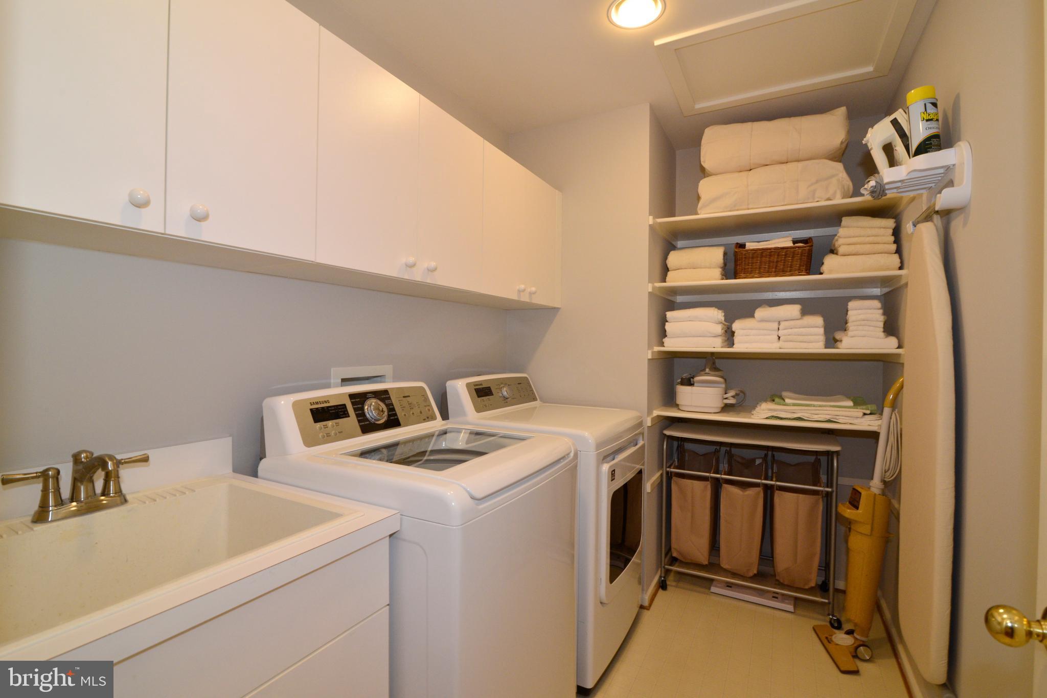 11520 Hemingway Drive Reston, VA 20194 - Photo 43 of 69 Upstairs laundry with storage and a utility sink