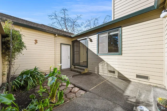 a view of a house with a patio