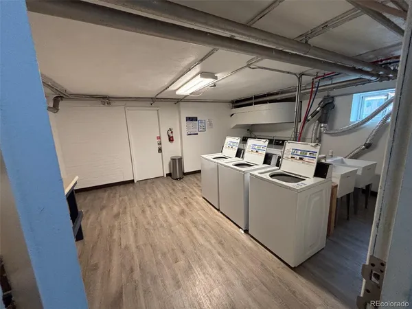a view of a storage & utility room with washer and dryer