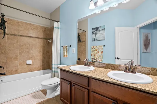 a view of a living room and floor to ceiling window