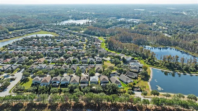 a view of a golf course with a lake