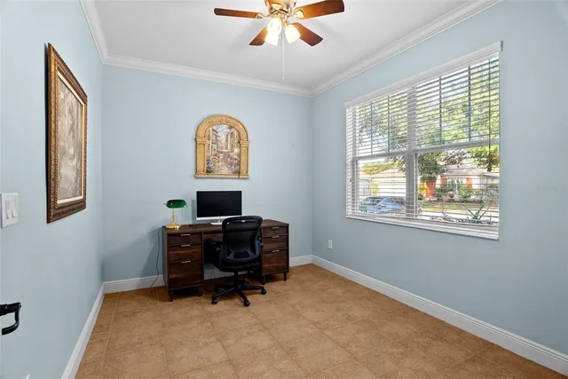 a workspace with furniture and a window