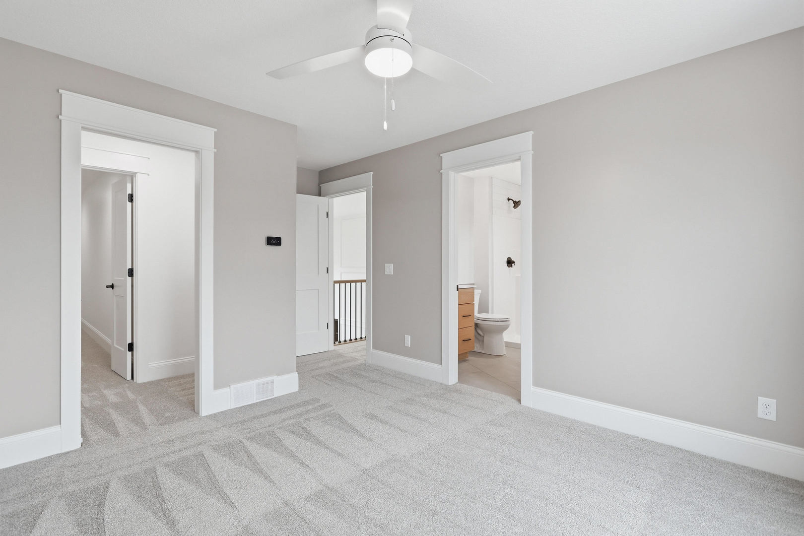6928 Wilderness Pointe Bettendorf, IA 52722 - Photo 42 of 48 an empty room with closet and a bathroom