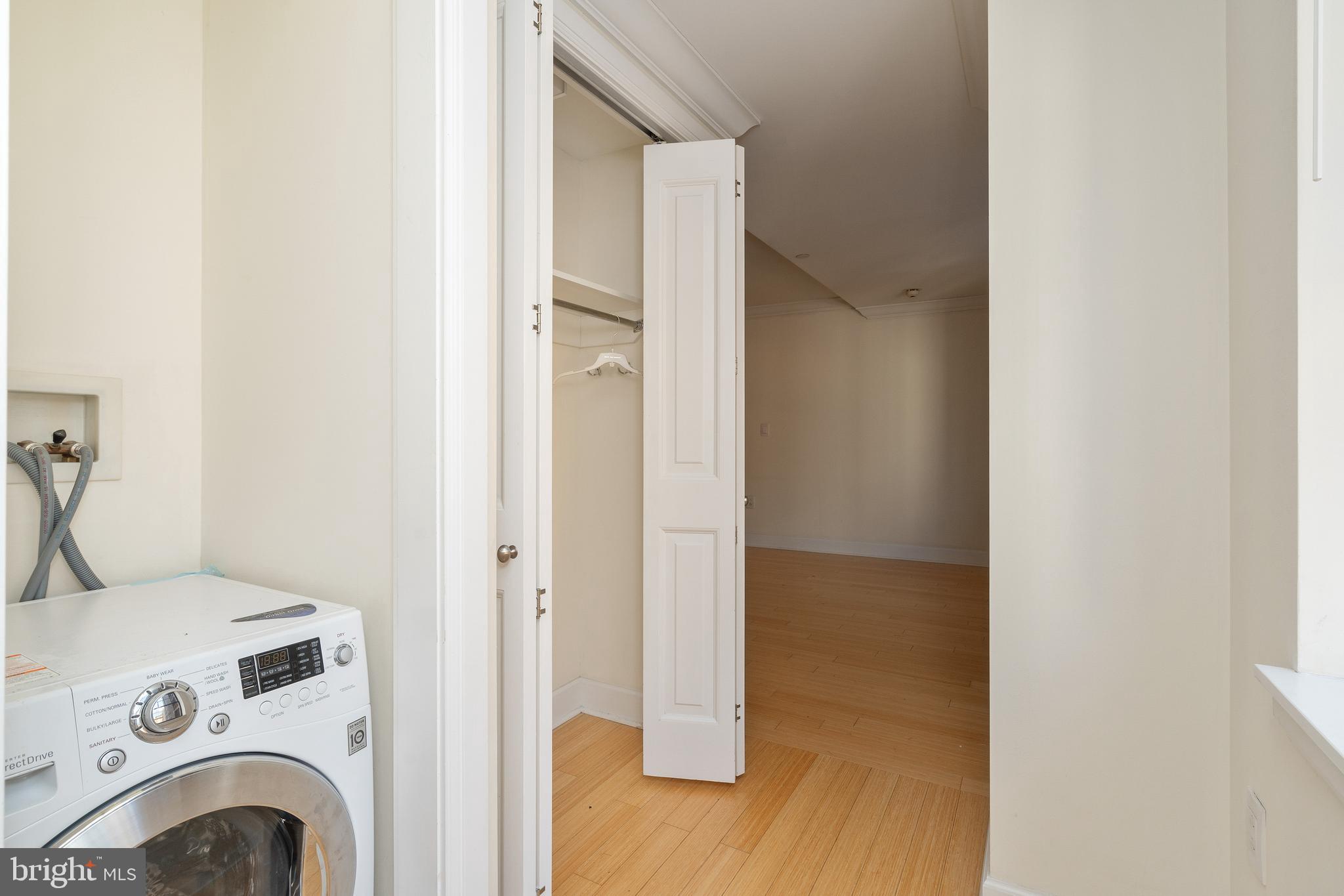 1701 Locust Street, Unit 1417 Philadelphia, PA 19103 - Photo 18 of 29 a view of livingroom with washer and dryer
