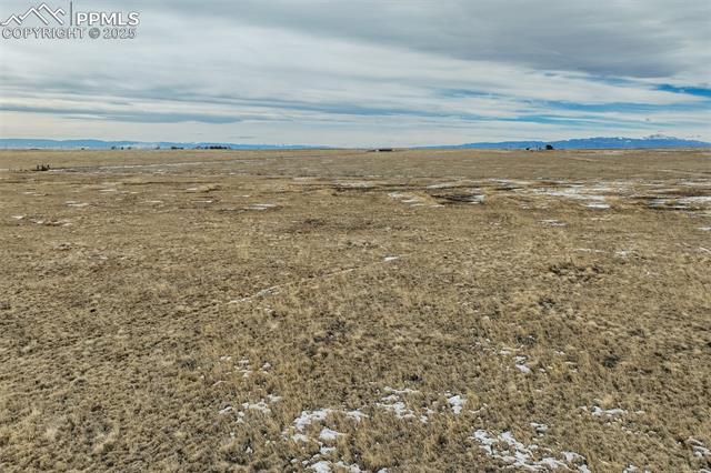 32290 North Neely Road Yoder, CO 80864 - Photo 23 of 26 Property view of water featuring a mountain view
