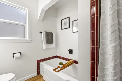 a bathroom with a sink and toilet