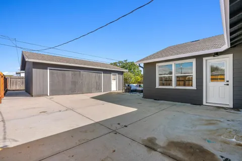 a view of an empty room with windows