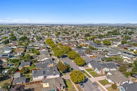 an aerial view of a city with lots of residential buildings