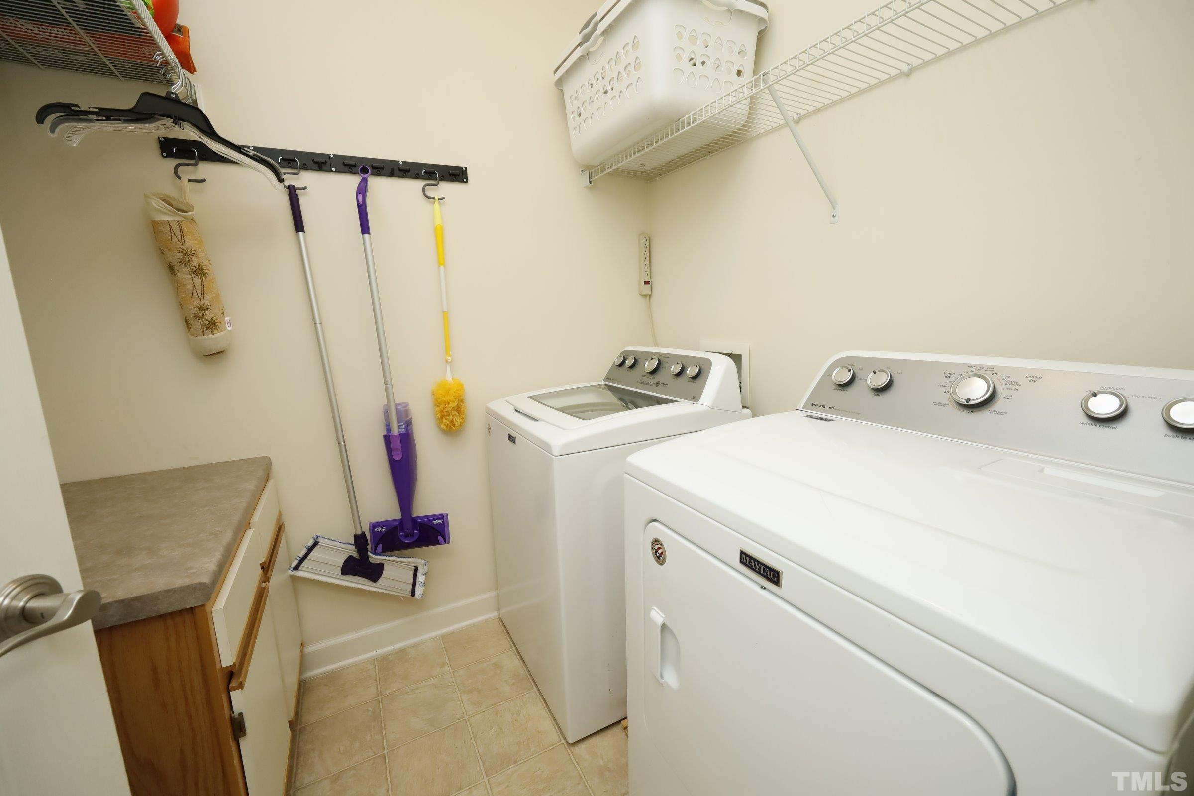 5325 Glass Ridge Road Raleigh, NC 27616 - Photo 20 of 42 a utility room with dryer and washer