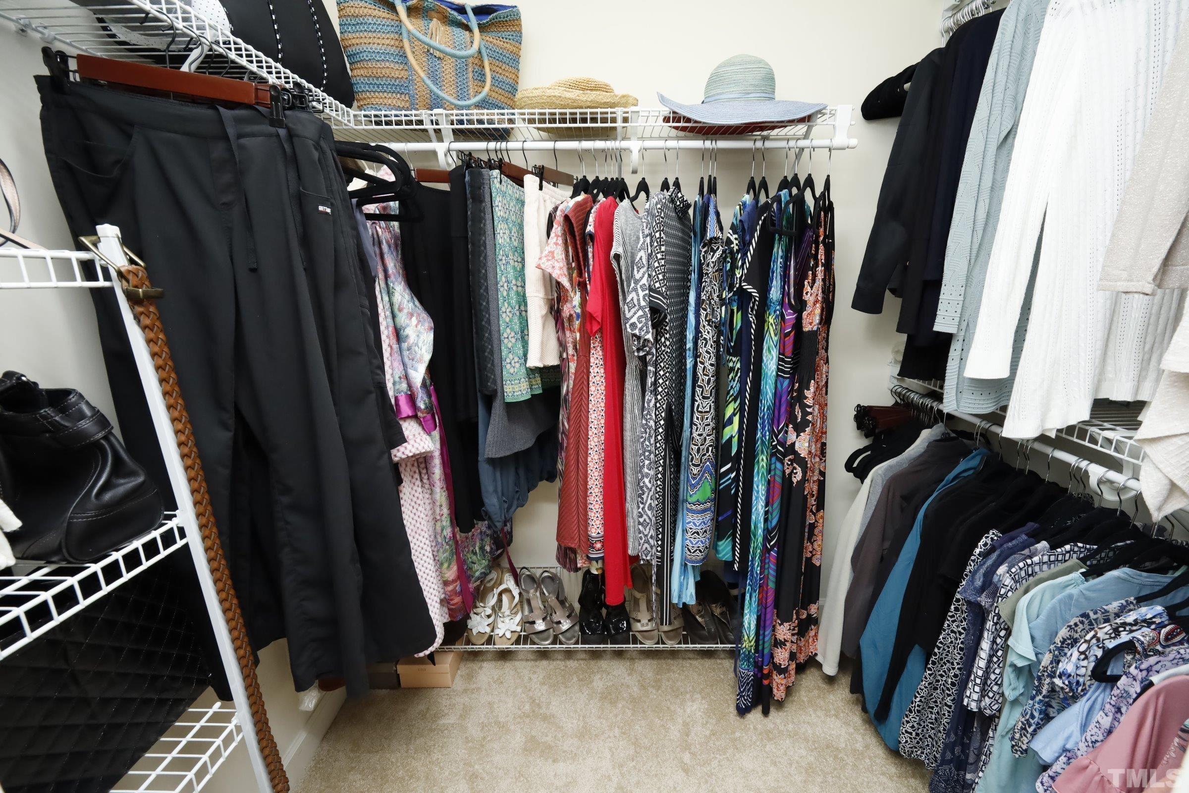 5325 Glass Ridge Road Raleigh, NC 27616 - Photo 26 of 42 a view of walk in closet with clothes