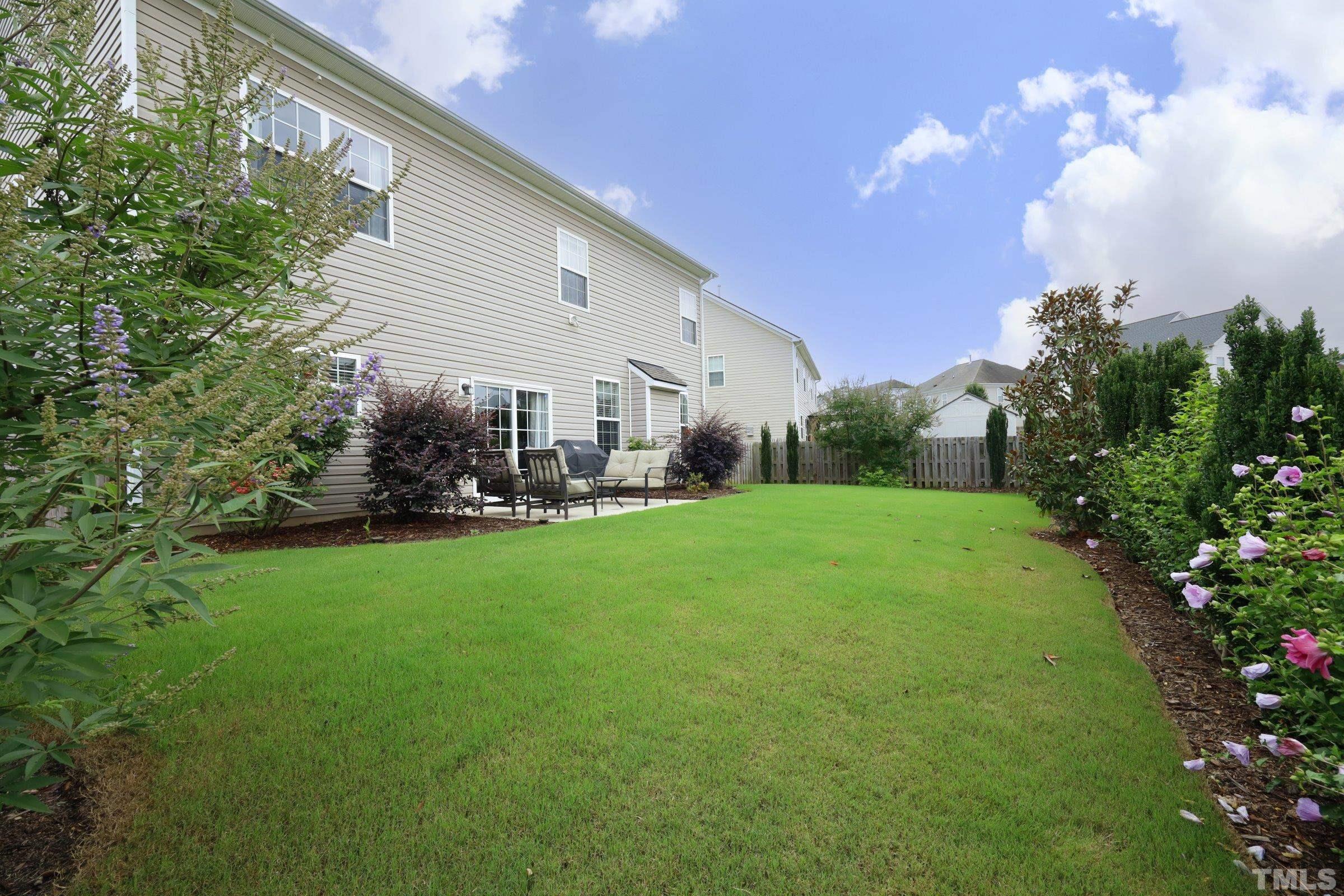 5325 Glass Ridge Road Raleigh, NC 27616 - Photo 36 of 42 a view of a house with backyard