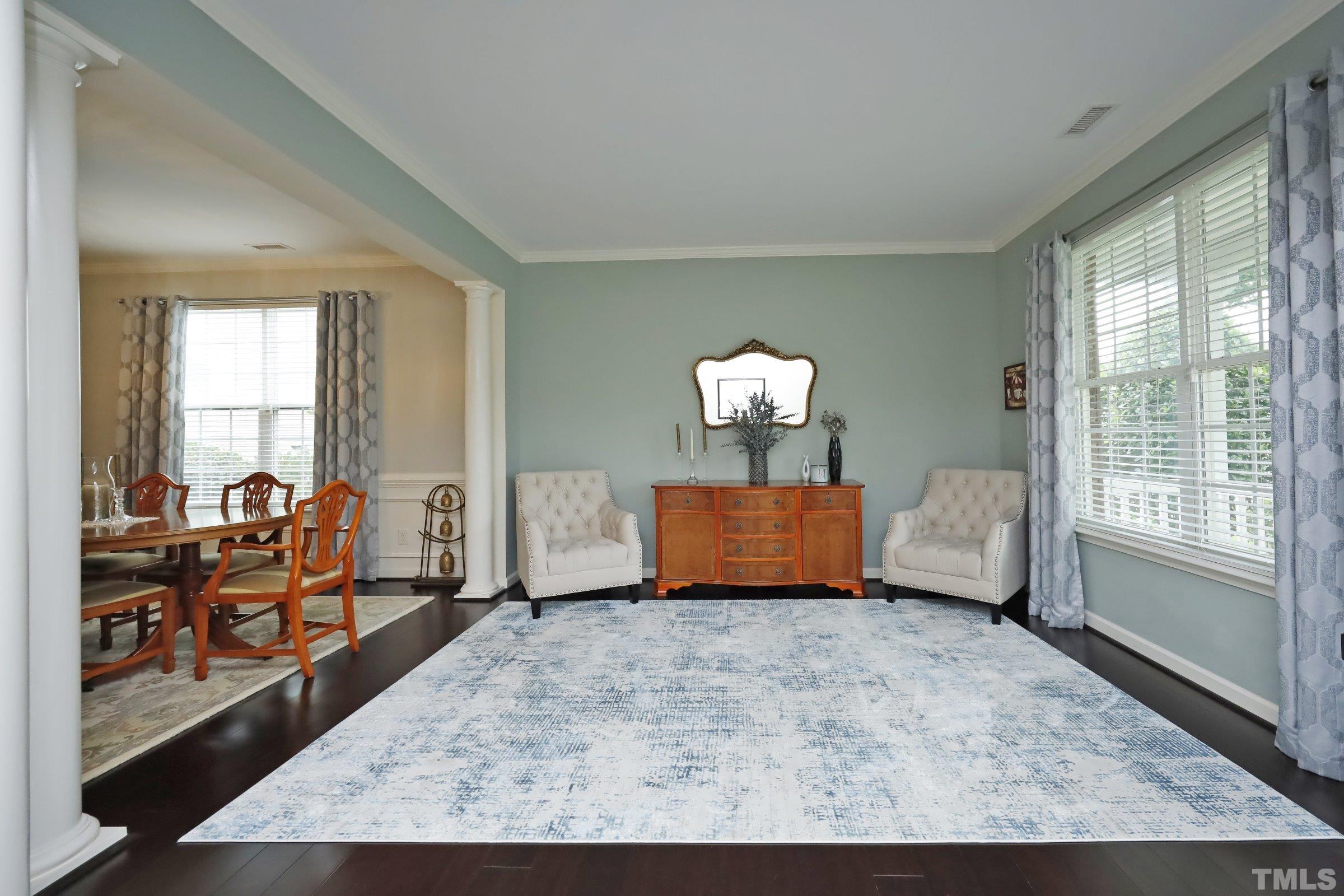 5325 Glass Ridge Road Raleigh, NC 27616 - Photo 4 of 42 a living room with furniture and a large window