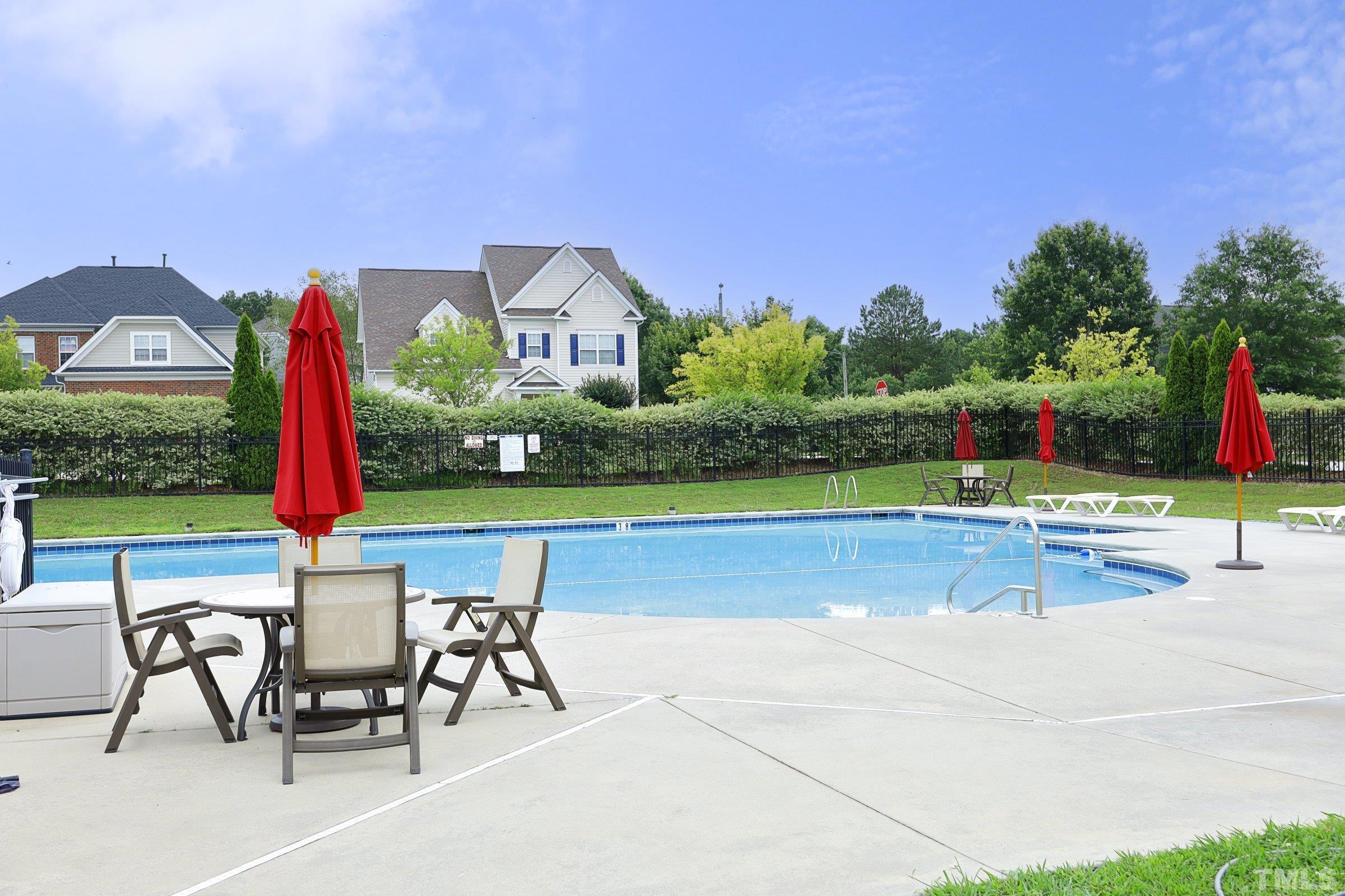 5325 Glass Ridge Road Raleigh, NC 27616 - Photo 41 of 42 a view of a house with swimming pool and sitting area