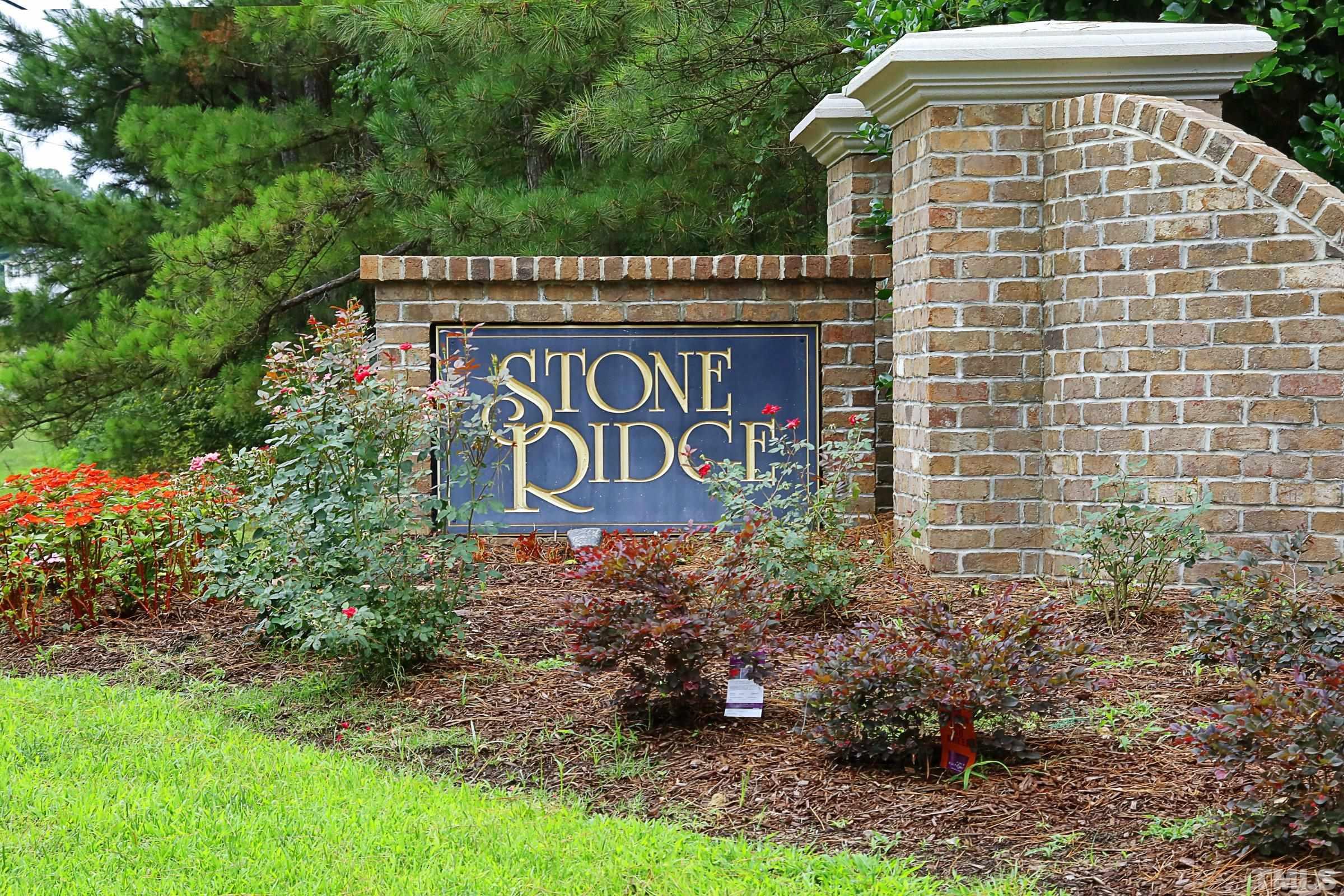 5325 Glass Ridge Road Raleigh, NC 27616 - Photo 42 of 42 a signage on a brick wall