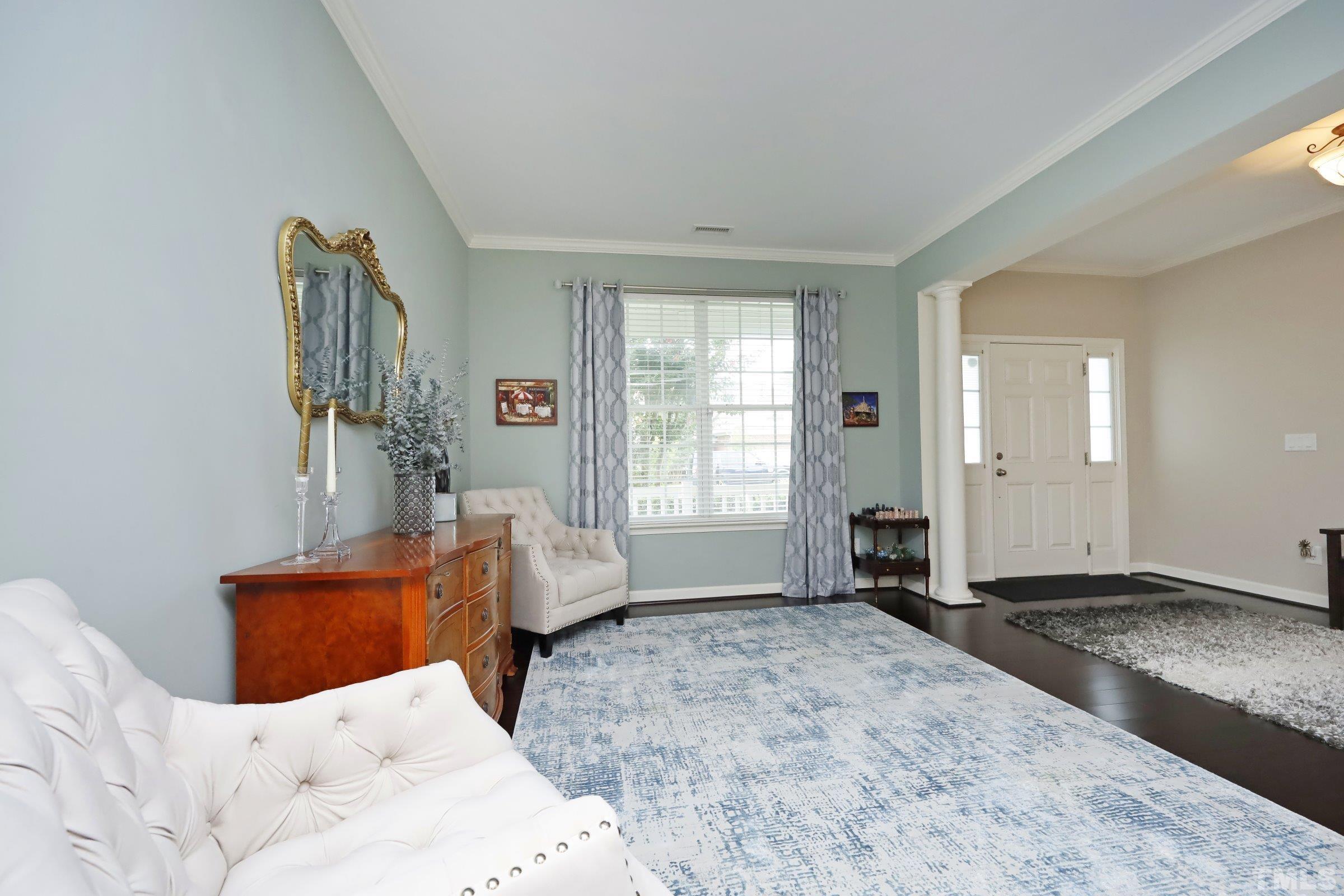 5325 Glass Ridge Road Raleigh, NC 27616 - Photo 5 of 42 a bed room with a bed and a window