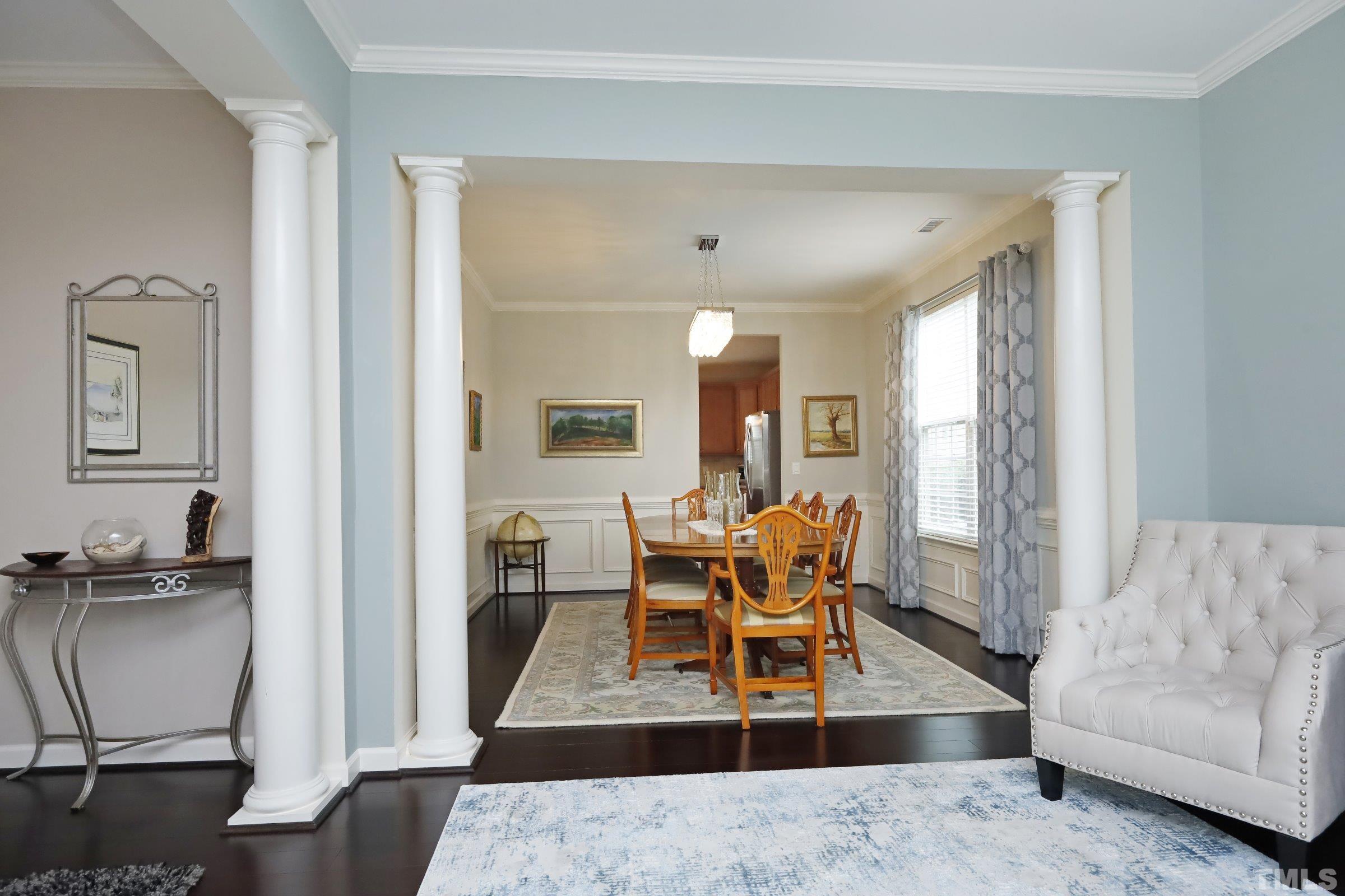 5325 Glass Ridge Road Raleigh, NC 27616 - Photo 6 of 42 a living room with furniture and wooden floor