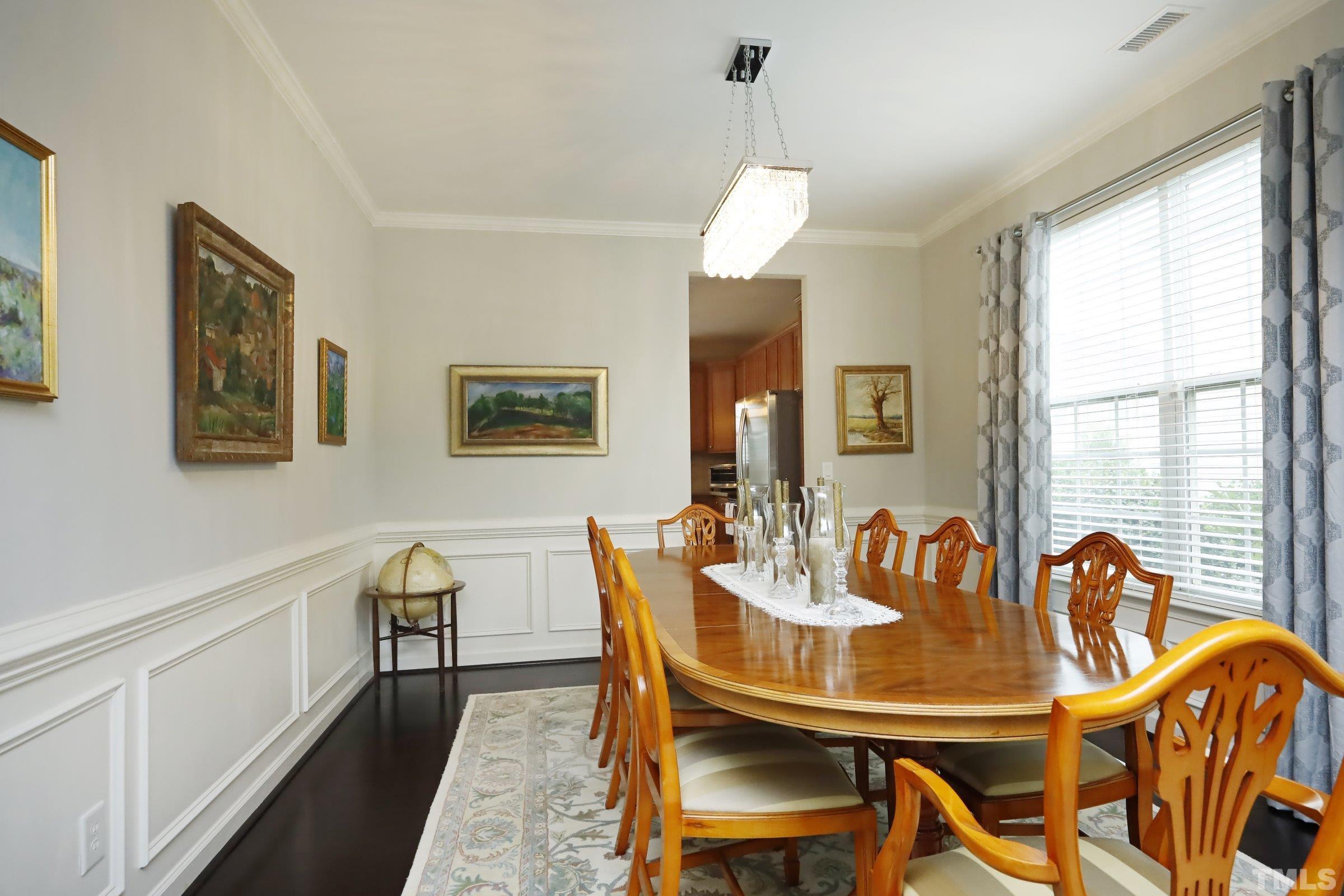 5325 Glass Ridge Road Raleigh, NC 27616 - Photo 7 of 42 a view of a dining room with furniture window and outside view