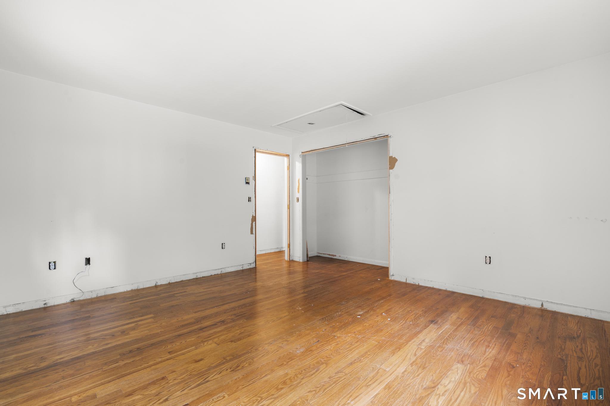 292 Branch Road Thomaston, CT 06787 - Photo 26 of 32 Upper floor second bedroom in need of trim and closet doors.
