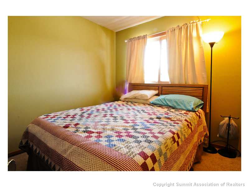 9490 Ryan Gulch Road, Unit 103 Silverthorne, CO 80498 - Photo 9 of 18 Bedroom.