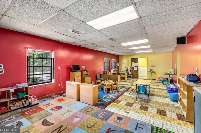 a view of a park with swings and slides