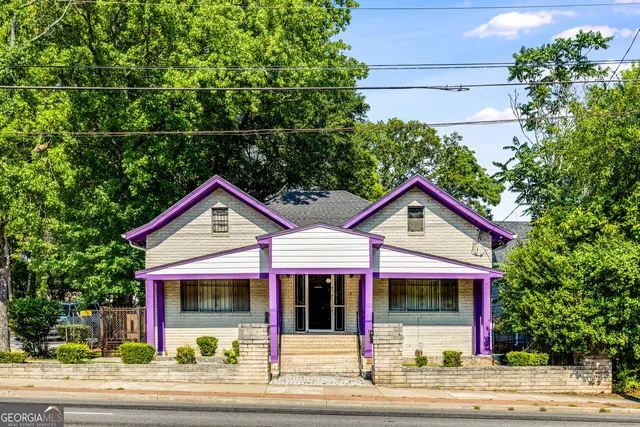 front view of a house with a small yard