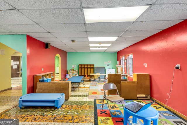 a outdoor space with lots of furniture and chairs