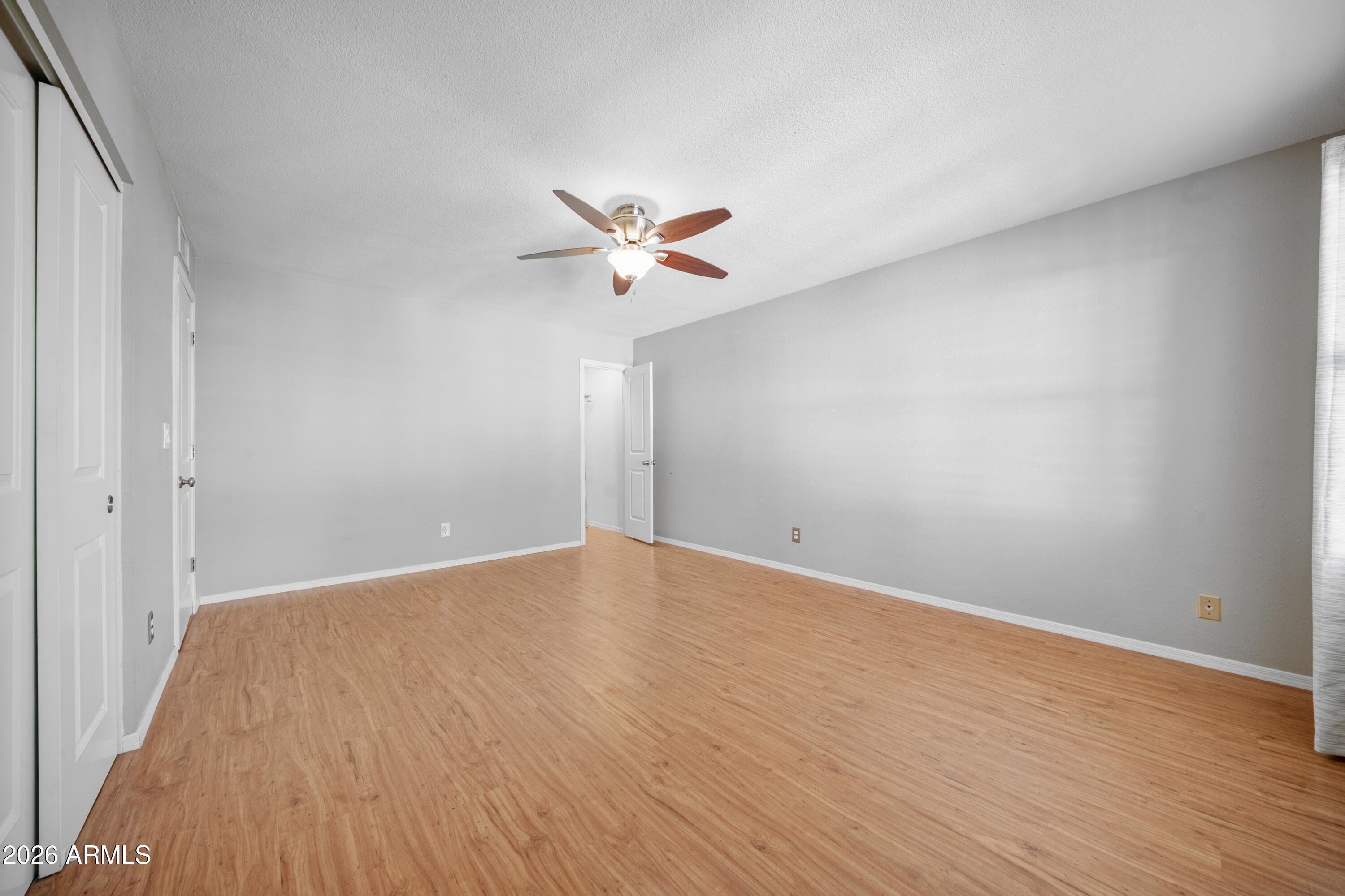 13230 North 3rd Way Phoenix, AZ 85022 - Photo 17 of 22 wooden floor in an empty room